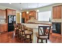 Kitchen featuring granite countertops, stainless steel appliances, and bar stool seating at 2887 Goldfinch Cir, Marietta, GA 30066