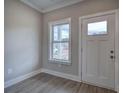 Bright entryway featuring wood-look flooring and a window with natural light at 201 Daisy Ct, Cartersville, GA 30121