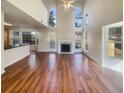 Bright living room features soaring ceilings, a fireplace, and a seamless flow into the adjacent area at 4405 Thorngate Ln, Acworth, GA 30101