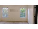 Bedroom view of wall showing two windows and a door at 4728 Sedum Way, Atlanta, GA 30349