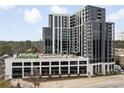 Modern condo exterior showcasing sleek design and architecture, complemented by beautifully landscaped surroundings at 2425 Peachtree Ne Rd # 1604, Atlanta, GA 30305