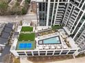 An aerial view of the rooftop pool and recreation deck at modern condominium building at 2425 Peachtree Ne Rd # 1604, Atlanta, GA 30305