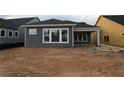 New construction home with a spacious yard and large windows for an abundance of natural light at 2040 Ripple Park Bend, Canton, GA 30114