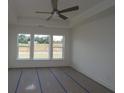 Bright bedroom with large windows providing great natural light and outdoor views at 2040 Ripple Park Bnd, Canton, GA 30114