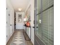 Inviting entryway with neutral walls, modern decor, and a stylish patterned runner at 208 Bastian Dr # 108, Villa Rica, GA 30180