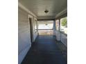 Inviting covered porch with classic railings perfect for relaxing outdoors at 550 Lake Dr, Hapeville, GA 30354