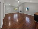 Bright living room with vaulted ceilings and a statement fireplace at 2548 Loghaven Nw Dr, Atlanta, GA 30318