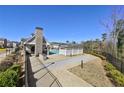 Pool and lounge area with covered seating and landscaping at 4362 White Spruce Aly, Doraville, GA 30360