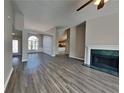 Spacious living room showcases fireplace and wood floors at 930 Rafington Dr, Lawrenceville, GA 30046