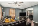 The living room features dark hardwood floors and neutral walls, creating a cozy atmosphere at 69 Polar Rock Sw Rd, Atlanta, GA 30315