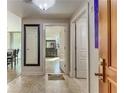 Inviting entryway featuring light-colored marble floors and a view of the dining area at 700 Park Regency Ne Pl # 603, Atlanta, GA 30326