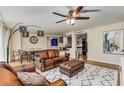 Well-lit living room featuring plush seating, stylish decor, and a cozy atmosphere at 700 Park Regency Ne Pl # 603, Atlanta, GA 30326