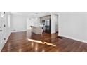 Spacious open concept kitchen and living room with beautiful hardwood floors at 1889 Cannon St, Decatur, GA 30032