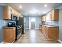 Spacious kitchen featuring stainless steel appliances, ample cabinet space, and modern countertops at 3449 Hyland Dr, Decatur, GA 30032