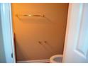 A small bathroom with a mounted golden towel rack at 100 Shoreline Dr, Fayetteville, GA 30215