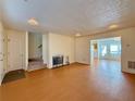 Spacious living room featuring a fireplace, wood floors, and recessed lighting at 3533 Mulberry Way, Duluth, GA 30096