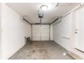 Spacious garage with a white garage door, ample lighting, and plenty of room at 3761 Turner Heights Dr, Decatur, GA 30032
