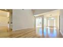 Spacious living room with hardwood floors and natural light at 4875 Gladstone Pkwy, Suwanee, GA 30024