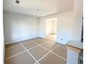 Bright, unfinished living room featuring clean white walls and abundant natural light, awaiting your personal touch at 66 Pine Creek Ct, Dallas, GA 30157