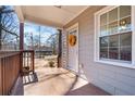 Inviting front porch with a lovely wreath, showcasing a welcoming entrance and curb appeal at 1686 Terry Mill Se Rd, Atlanta, GA 30316