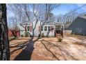 Charming home with a manicured front yard and inviting curb appeal at 1686 Terry Mill Se Rd, Atlanta, GA 30316