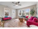 Bright and airy living room with large windows, hardwood floors, and stylish modern furniture at 1686 Terry Mill Se Rd, Atlanta, GA 30316