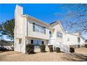 Charming two-story home with a well-maintained front yard and welcoming entrance at 4415 Roche St, Atlanta, GA 30349