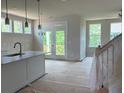 Open living space with access to an outdoor deck, perfect for indoor-outdoor living at 385 Riverwood Pass, Dallas, GA 30157