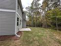 Spacious backyard with a concrete patio at 1102 Campbell Rd, Covington, GA 30014