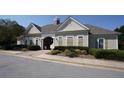 Attractive community clubhouse with gray siding and green shutters at 536 Highland Falls Dr, Hiram, GA 30141