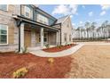 Close-up view of the home's entrance, showcasing a covered porch and inviting entryway at 700 Hedwig Drive (Lot 91), Mcdonough, GA 30252