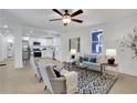 Bright, open-concept living area with modern furniture and a seamless flow into the kitchen at 1576 Elixir Sw Ave, Atlanta, GA 30314