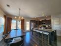 Beautiful kitchen with granite countertops, stainless steel appliances, and island seating at 1132 Red Bud Cir, Villa Rica, GA 30180