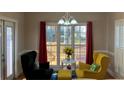 Bright sitting area with large windows, comfortable seating, and a view at 2860 Pine St, Duluth, GA 30096