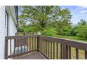 Outdoor deck offers a peaceful spot to relax with views of the backyard at 43 George Lemon Dr, Mcdonough, GA 30253