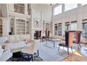 Elegant living room with fireplace, built-in shelves, and ample seating for entertaining guests at 179 Worthington Way, Jonesboro, GA 30236