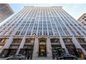 Tall Healey building featuring rows of windows against a bright blue sky at 57 Forsyth Nw St # 4H, Atlanta, GA 30303