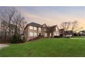 Spacious two-story home with expansive lawn and beautiful landscaping at 551 Straton Chase Se, Marietta, GA 30067