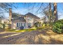 Spacious backyard with patio area, perfect for outdoor entertaining and relaxation at 1208 Lauren Nw Ct, Acworth, GA 30101