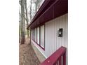 Charming home exterior with newer windows and traditional siding at 4829 Woodhurst Way, Stone Mountain, GA 30088
