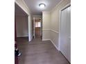 Spacious foyer with updated flooring and neutral wall paint at 4829 Woodhurst Way, Stone Mountain, GA 30088
