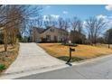 Traditional home with well-kept lawn, and long driveway at 3215 Northbrook Dr, Atlanta, GA 30341