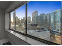 City skyline view from inside a condo with floor to ceiling windows at 215 Piedmont Ne Ave # 1608, Atlanta, GA 30308