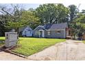 Well-maintained front yard and appealing exterior; an inviting suburban home at 672 Quillian Ave, Decatur, GA 30032