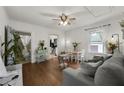 Bright living room featuring hardwood floors, a comfortable sofa, and lots of natural light at 818 Virgil Ne St, Atlanta, GA 30307