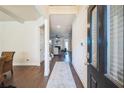 Welcoming foyer with hardwood floors and an open view into the living room at 1109 Alaska St, Hampton, GA 30228