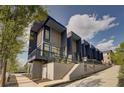 Modern townhome exterior featuring sleek design, large windows, and professional landscaping at 816 Berne St # 4, Atlanta, GA 30316