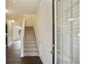 Inviting foyer with staircase and natural light from the front door, leading to the home's living spaces at 326 Lauren Dr, Fairburn, GA 30213