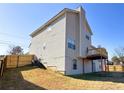 View of the backyard featuring a deck and fenced in yard at 5546 Wellborn Creek Dr, Lithonia, GA 30058
