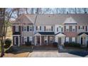 Attractive townhomes displaying coordinated facades, tidy landscaping, and convenient parking at 902 Tree Creek Blvd # 2, Lawrenceville, GA 30043